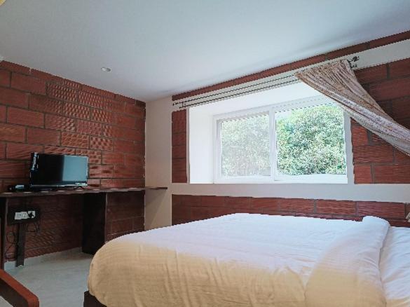 Coorg Vismaya Resort Madikeri Zewnętrze zdjęcie